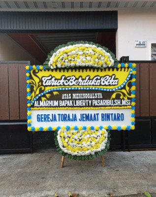 Papan Bunga Duka di Lateri